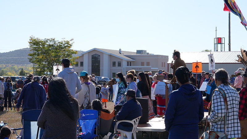 Gathering at memorial site