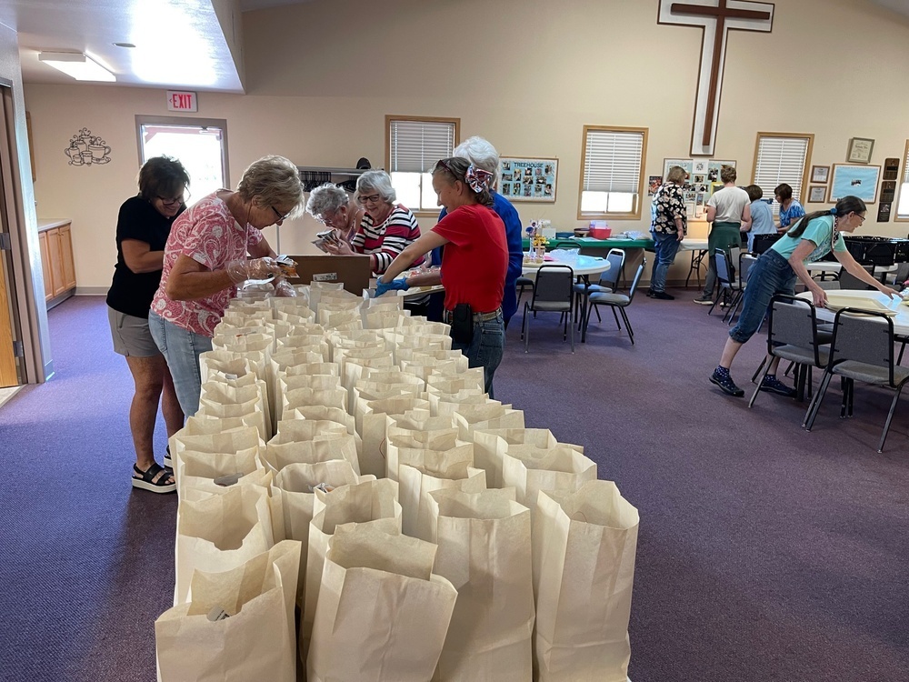 Sack lunches on a church table