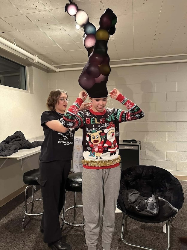 youth with Christmas decorations