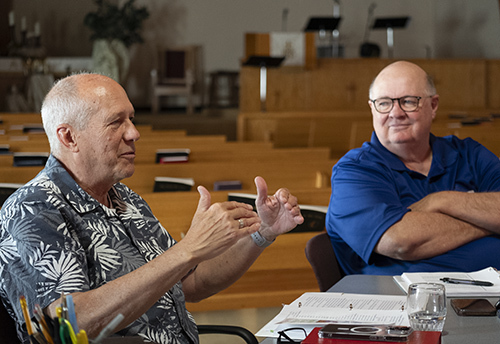 Two men at table