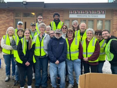 group in vests at food pantry