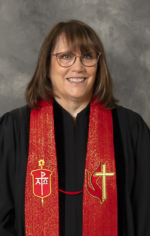 Bishop in robe with stole