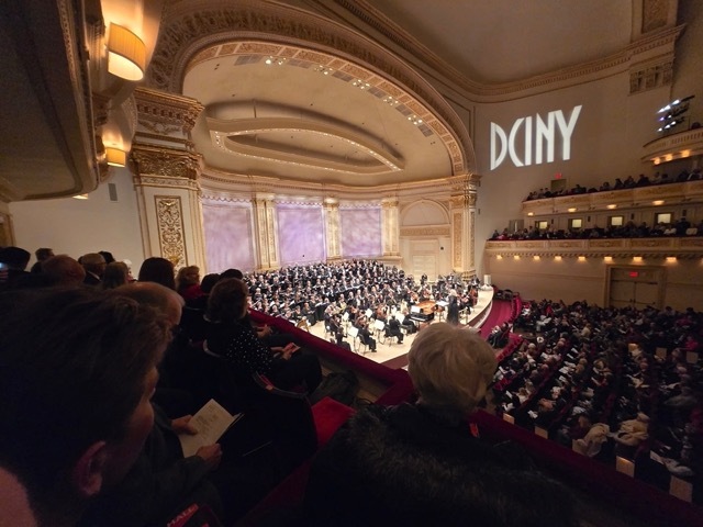 Balcony view of choir and orchestra