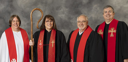 Four clergy in robes