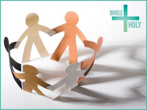 Paper-cut of people holding hands