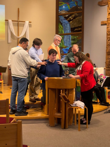 Confirmation scene on church chancel
